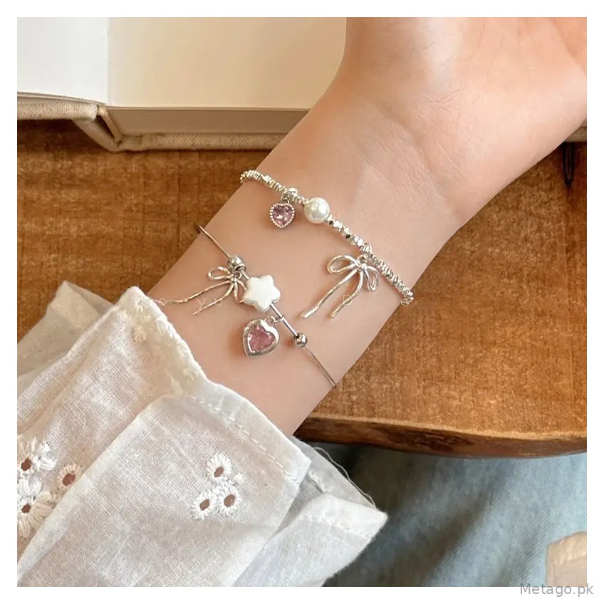 Broken Silver Bracelet with Love Bow & Pearl Accents
