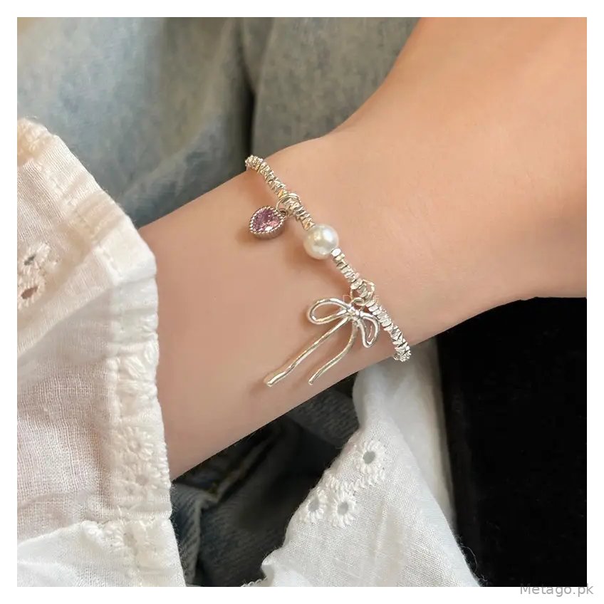 Broken Silver Bracelet with Love Bow & Pearl Accents